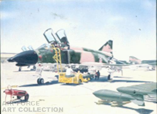 F-4 ON GROUND LOADING MUNITIONS